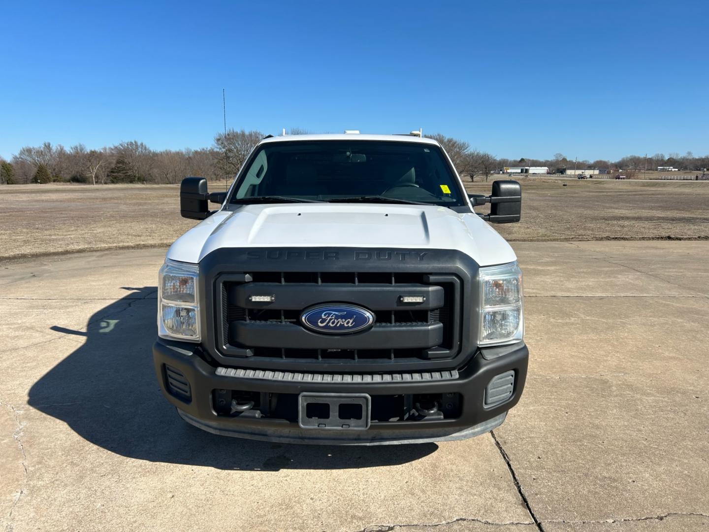 2015 White /Gray Ford F-250 SD (1FT7X2A62FE) with an 6.2L V8 OHV 16V engine, 6-Speed Automatic transmission, located at 17760 Hwy 62, Morris, OK, 74445, (918) 733-4887, 35.609104, -95.877060 - 2015 FORD F250 HAS THE 6.2 V8 ENGINE. THIS TRUCK IS BI-FUEL (RUNS ON BOTH CNG OR GASOLINE) FEATURES MANUAL SEATS, MANUAL LOCKS, MANUAL WINDOWS, MANUAL MIRRORS, AM/FM RADIO, CRUISE CONTROL, TRACTION CONTROL, BACK UP CAMERA. EQUIPPED WITH A WESTPORT BI-FUEL CNG FUEL SYSTEM. IT RUNS ON CNG (COMPRESSED - Photo#1